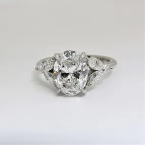 Oval Diamond and Marquise petals Engagement Ring
