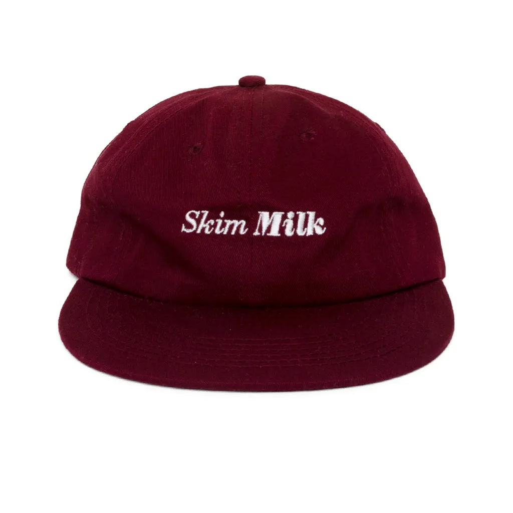 skim milk logo (maroon)