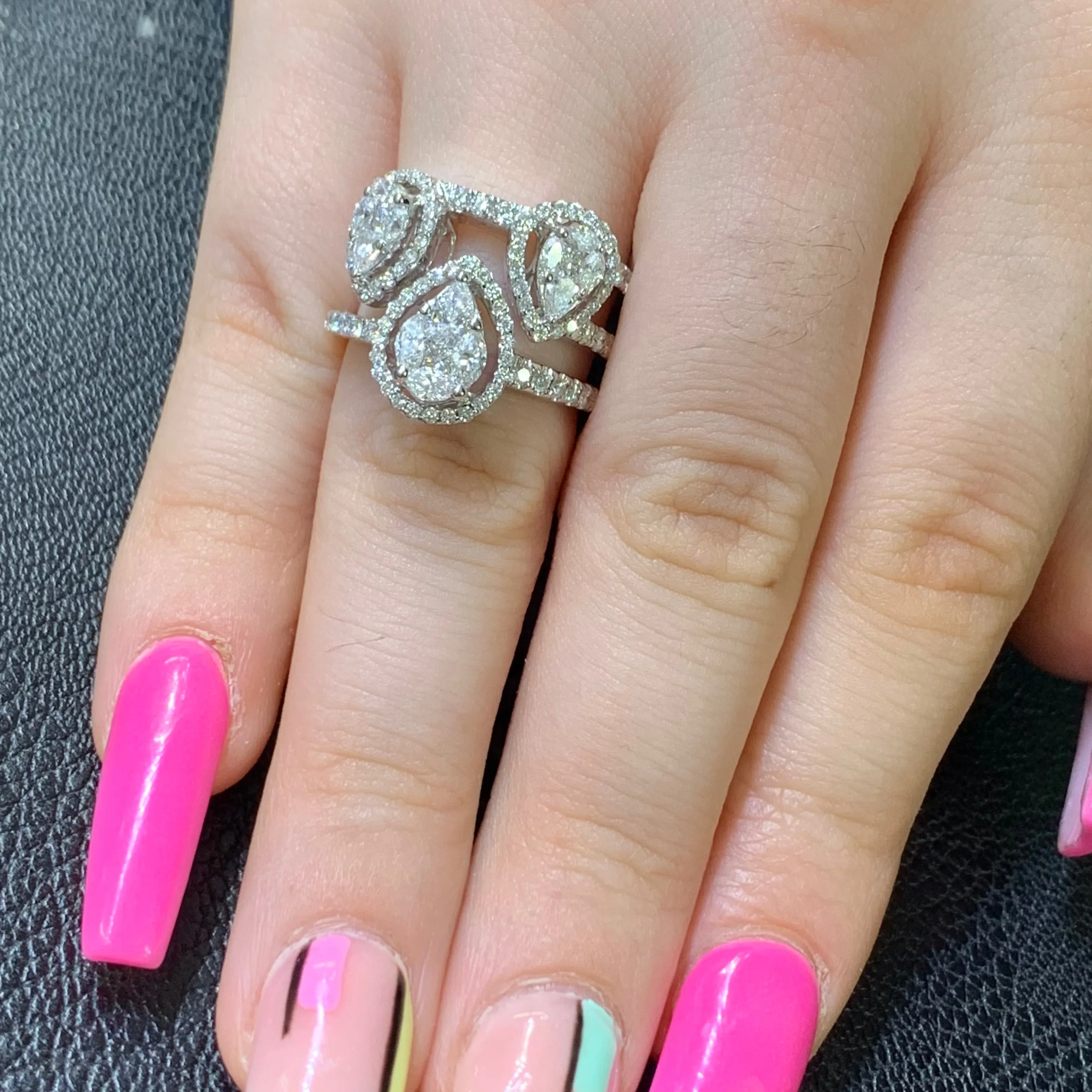 VVS/vs high clarity diamonds set in a 18k White Gold Three Tear Drops Ladies' Ring (VVS diamonds)