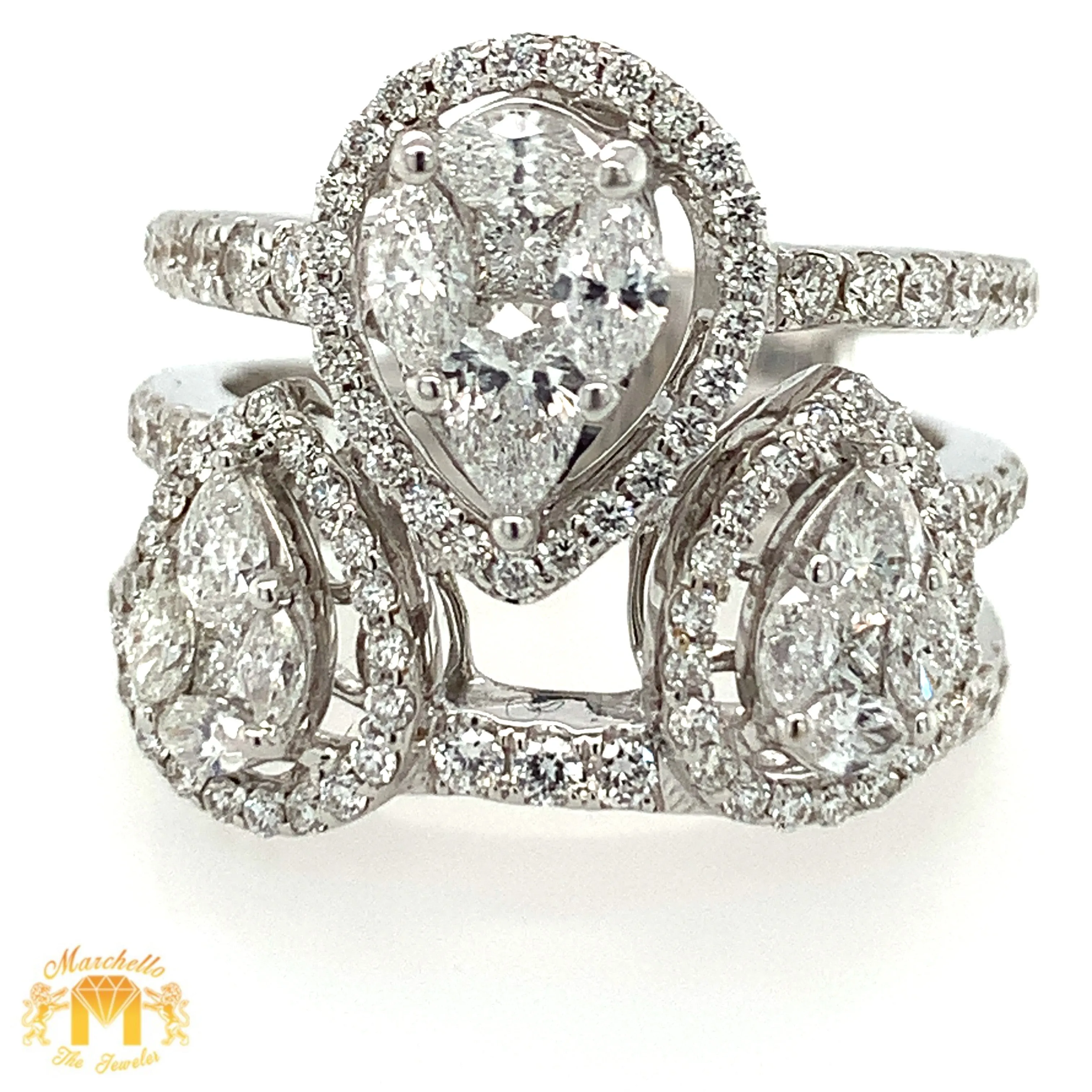 VVS/vs high clarity diamonds set in a 18k White Gold Three Tear Drops Ladies' Ring (VVS diamonds)